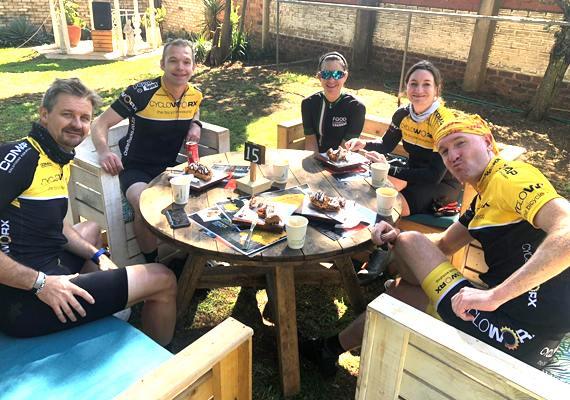Enjoying a coffe and snack break during a tough weekend ride